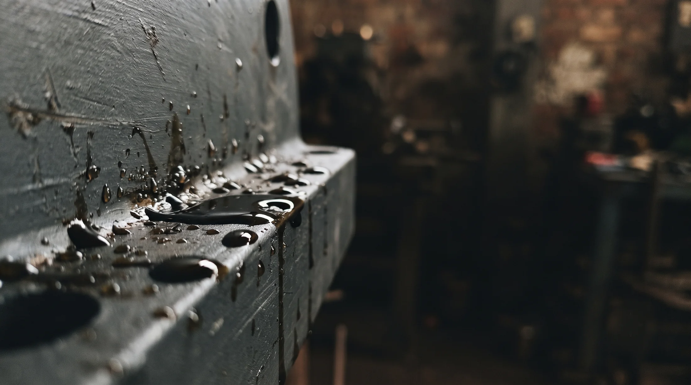 Oil beading on a primed steel flange
